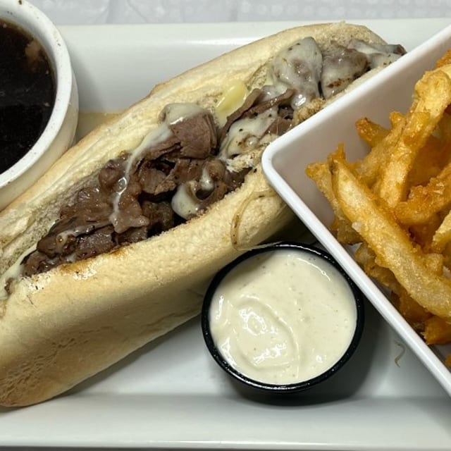 Slow Roasted Prime Rib French Dip Sandwich.